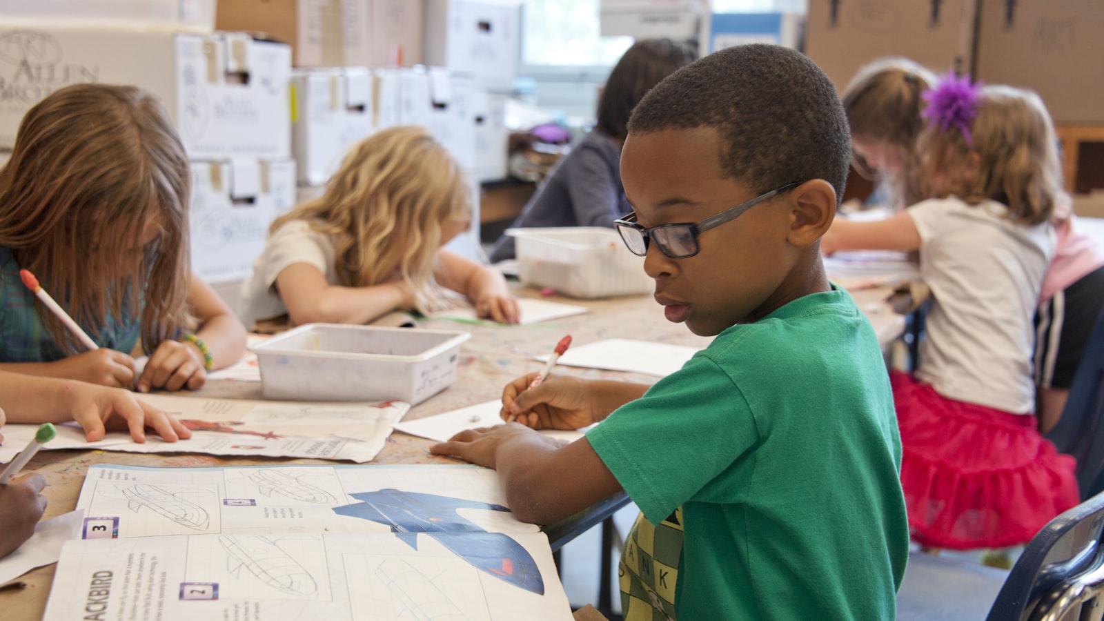Higher Ground Academy students working together in a classroom.